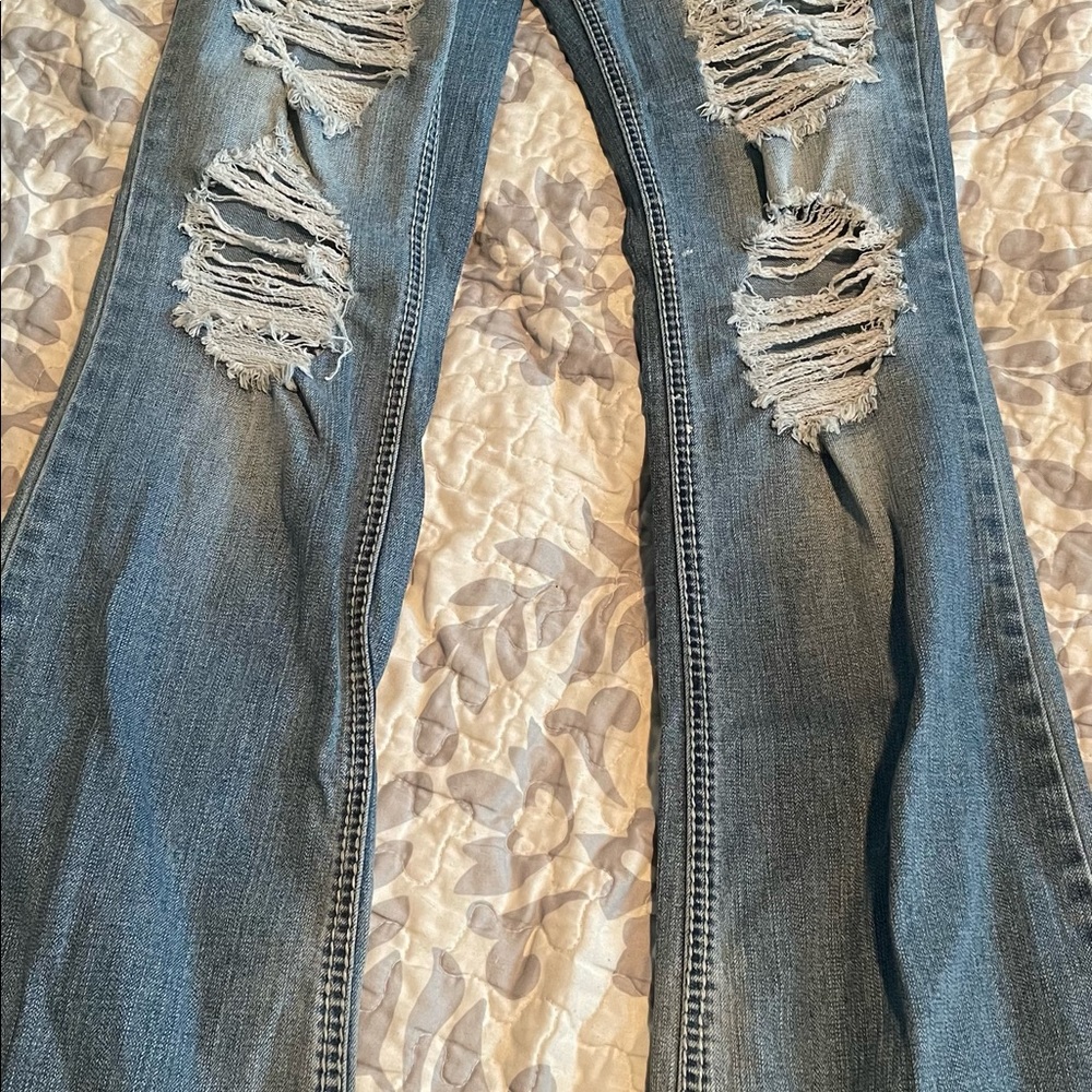 Ripped flared jeans